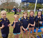 3 Year 4 girls with a 1st and 2nd placing awesome effort over all by everyone